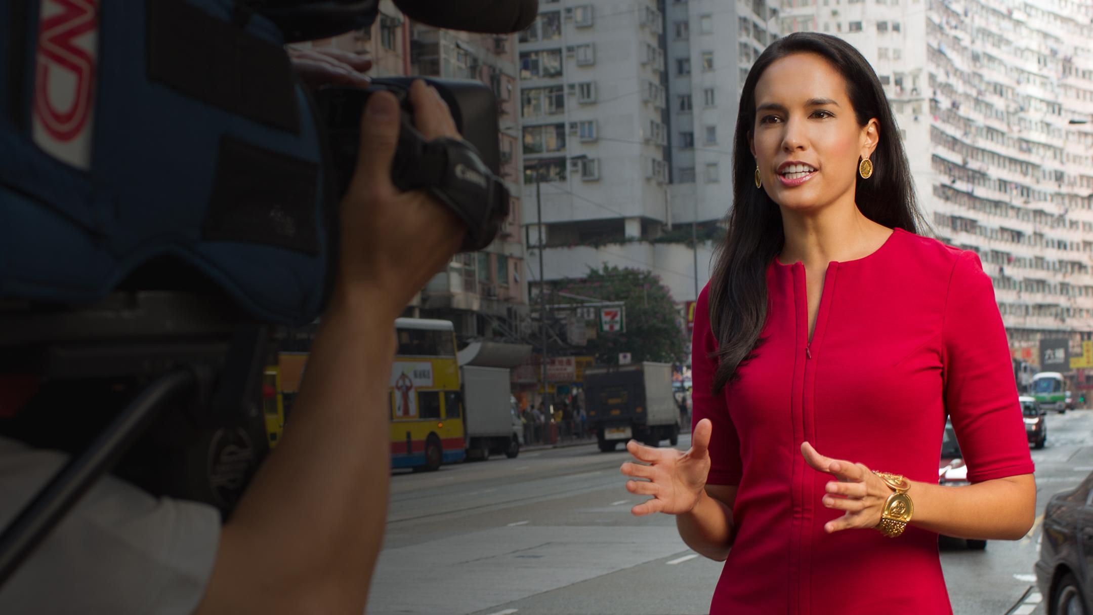 journalist talking to camera